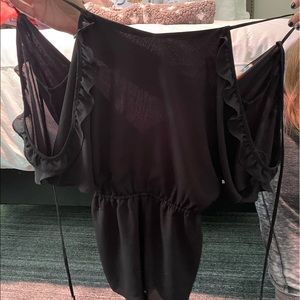 Black ruffled romper.